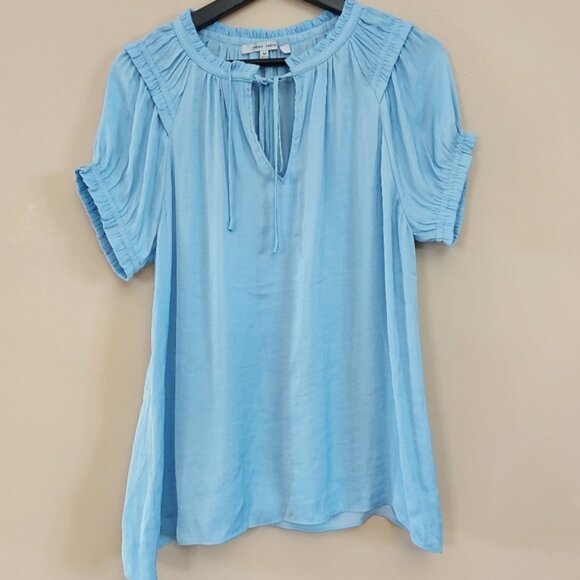 Naked Zebra baby blue blouse with front tie detail and ruffle on the neckline - Picture 1 of 6